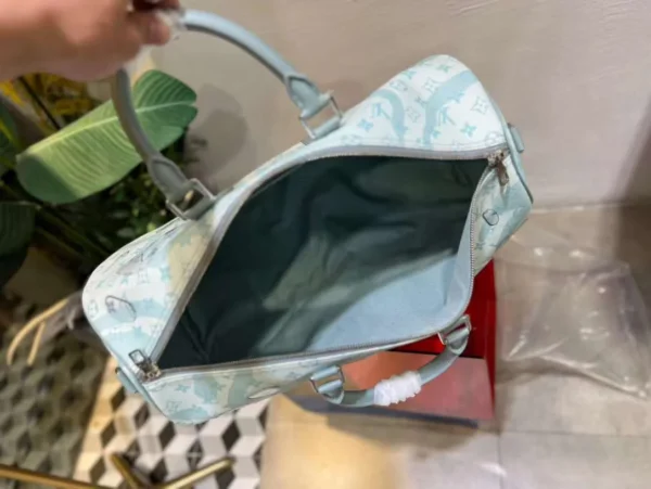 LV Keepall Bandoulière 50 Bag in Monogram Aquagarden - RBV15