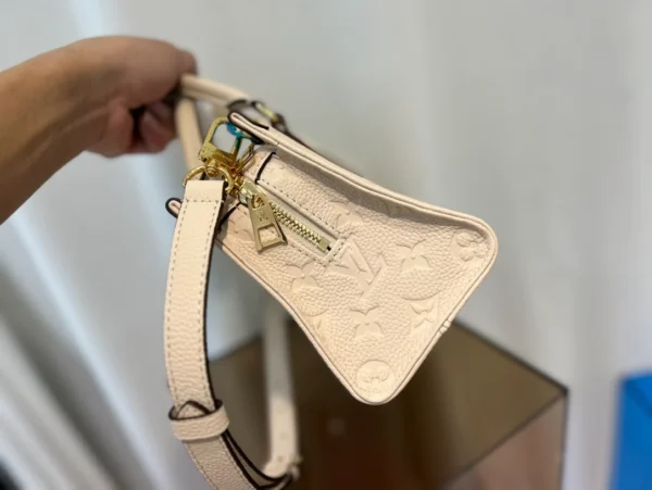 LV OnTheGo East West Monogram Empreinte Leather - RLB14