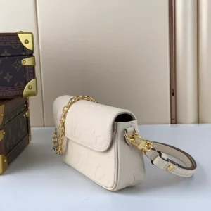 LV Wallet On Chain Ivy Monogram Empreinte Leather - RLB37